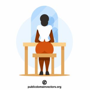 woman sitting in front of mirror
